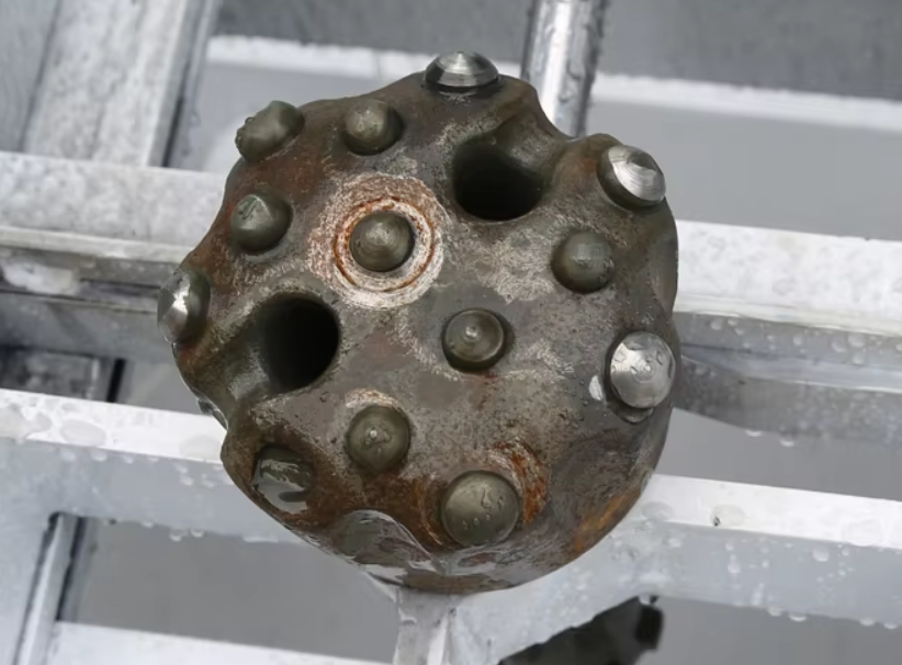 Picture of the drill bit being repaired by the machine1